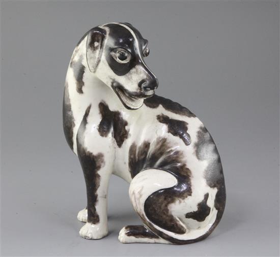 A Chinese export model of a seated hound, first half 18th century, height 19.5cm